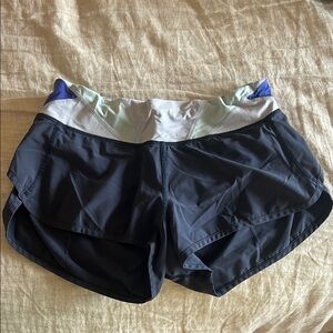 Lululemon Athletica Navy Hotty Hot shorts with design on band